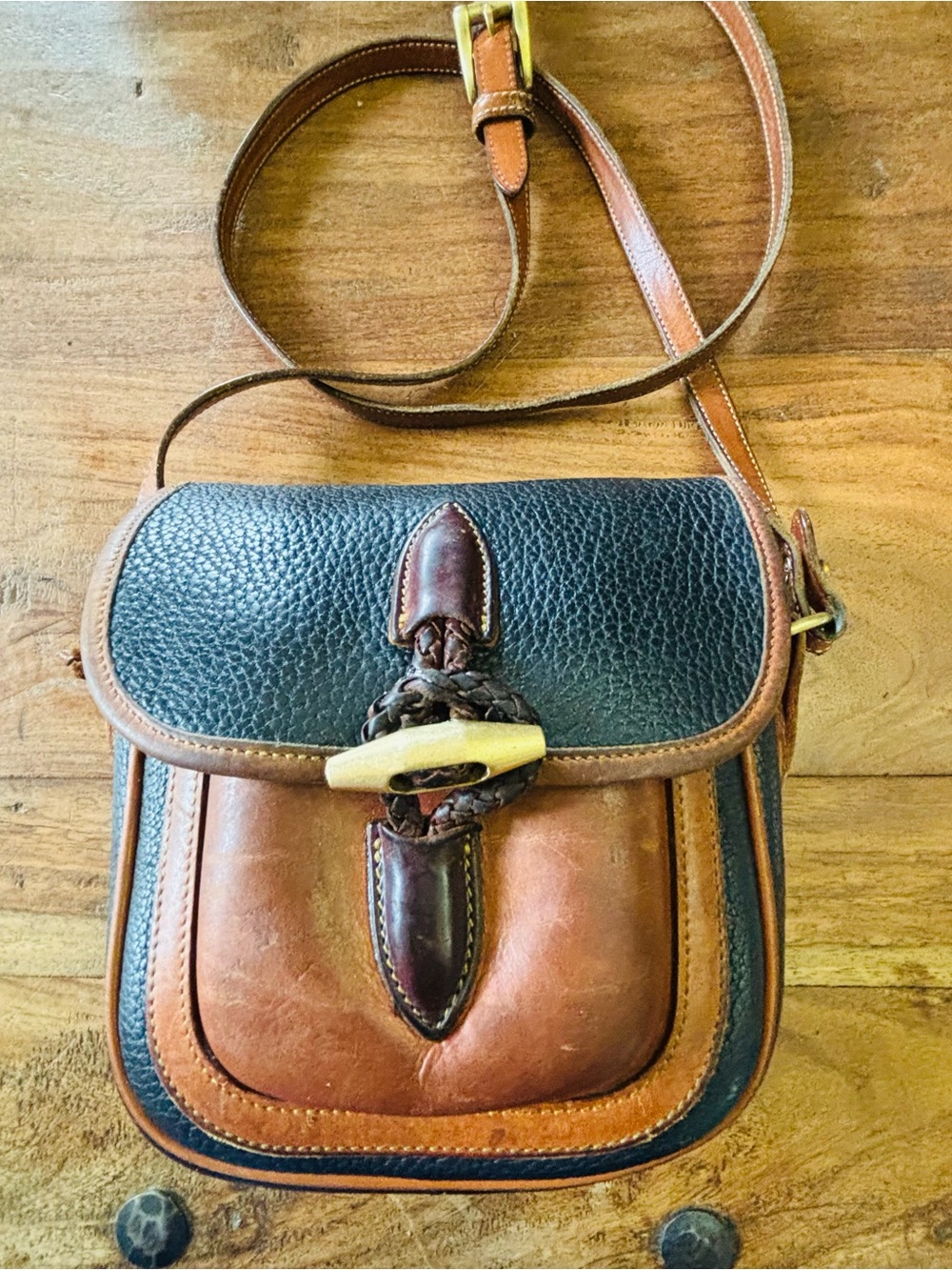 Vintage Dooney & Bourke Black and Brown  Leather Crossbody with Brass Charm